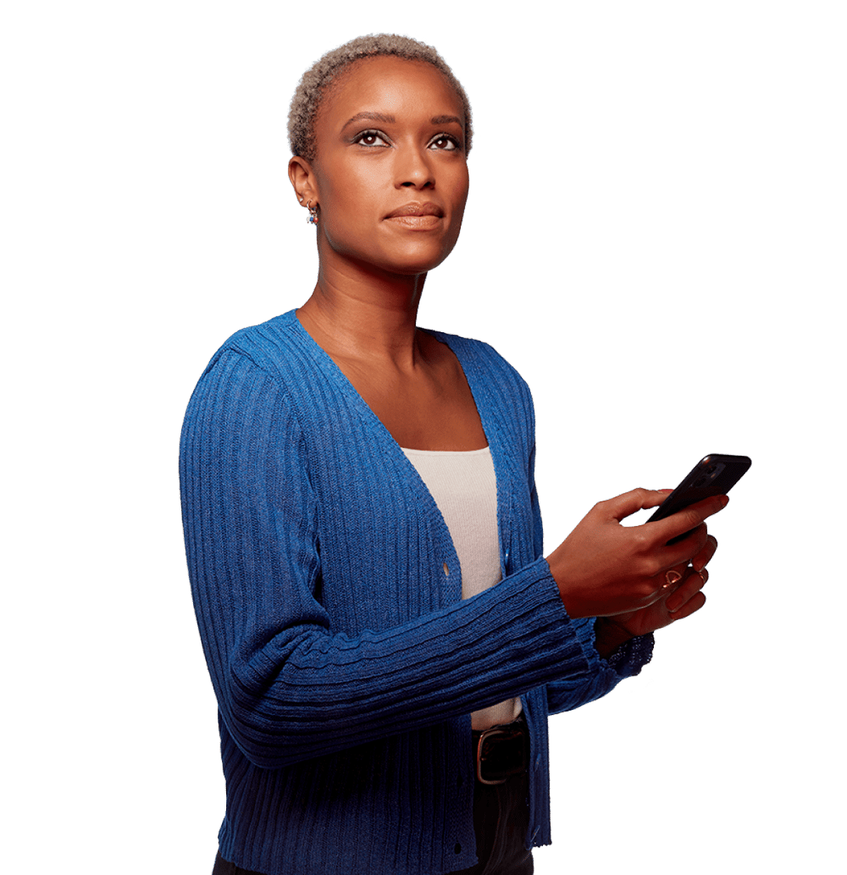 woman holding phone looking away